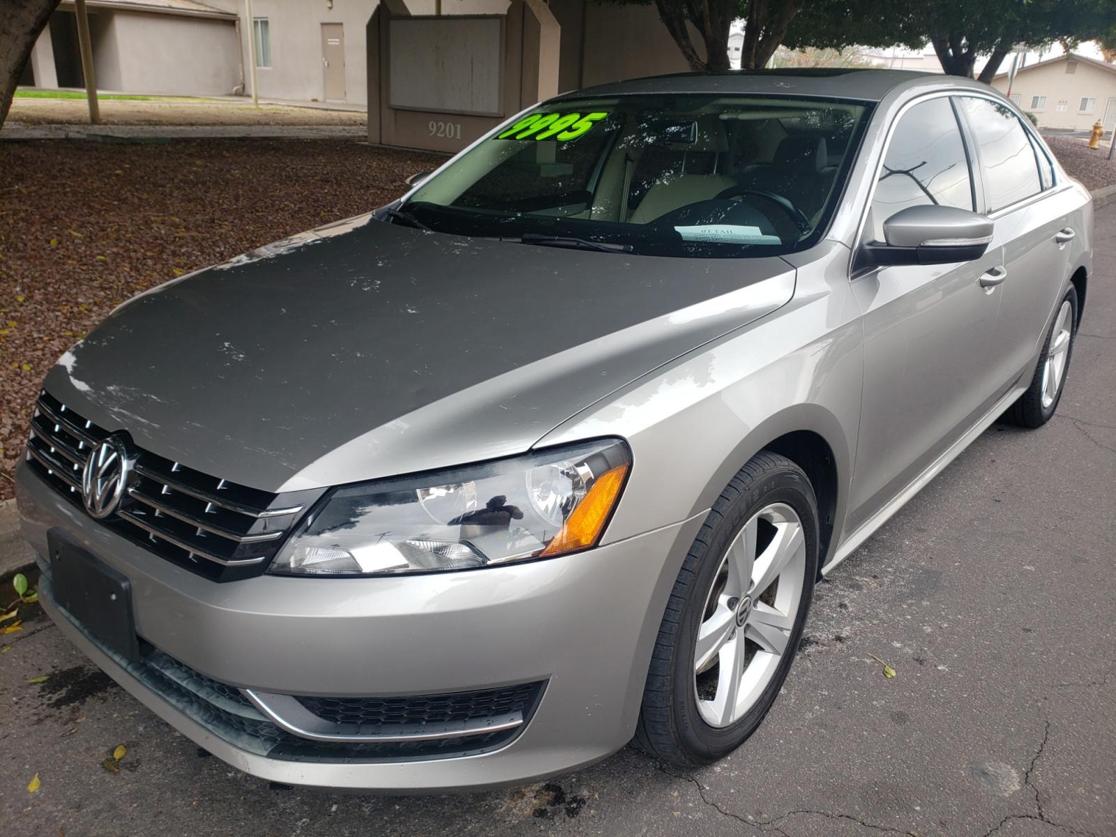 2013 /tan Volkswagen Passat SE (1VWBN7A32DC) with an 2.0L L4 DOHC 16V engine, 5-Speed Automatic transmission, located at 323 E Dunlap Ave., Phoenix, AZ, 85020, (602) 331-9000, 33.567677, -112.069000 - 2013 Volkswagen Passat TDI SE,....... ONLY 128K Miles..... EXCELLENT condition, A Real Must See!!.... No accidents, Ice cold ac front and rear, Stereo/CD Player, Satellite compatible, Bluetooth, Phone sync, Clean Tan interior with Tan Leather seats in near perfect condition, Gorgeous tinted sunroof, - Photo #0